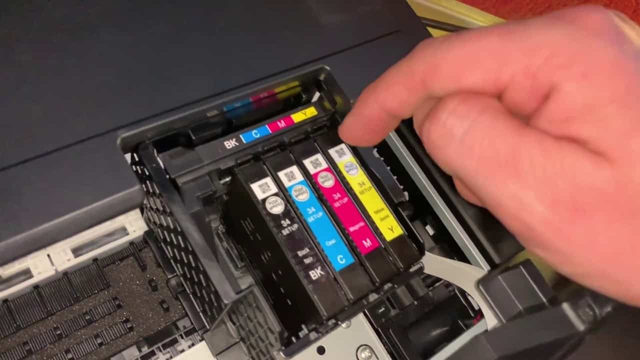 Insert the fresh ink cartridge in the slot